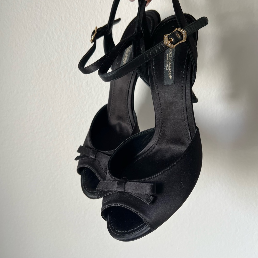 Dolce and Gabbana satin peep toe high heels.